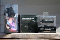 The ContourHD in its packaging, with the car charger and windscreen suction mount.