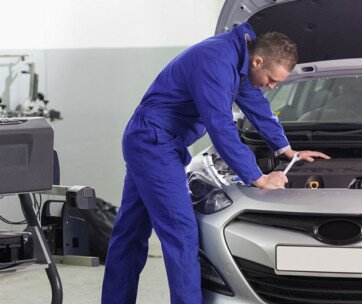 Mechanic looking at the engine